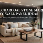 A luxurious modern living room with a prominent dark charcoal stone marble UV PVC feature wall behind a cream sofa and warm wood furniture.